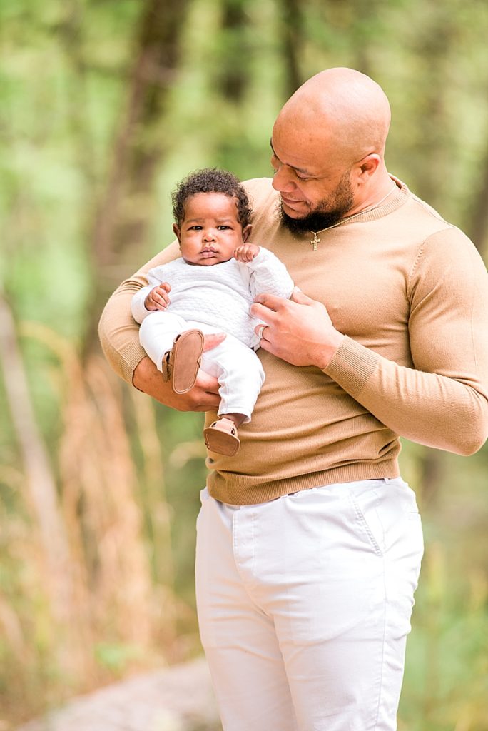 Black dad with newborn son