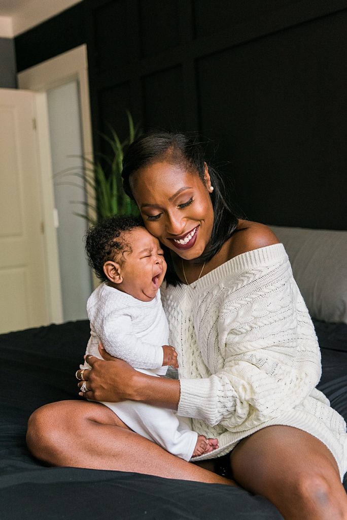 Chapel Hill Family Session Black mom in bedroom with newborn son