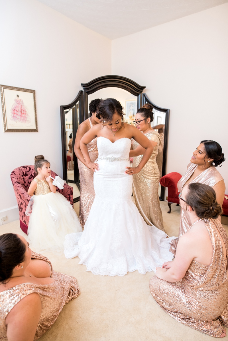 Bride Getting Dressed | Chronicles Photography | www.chroniclesphotography.com