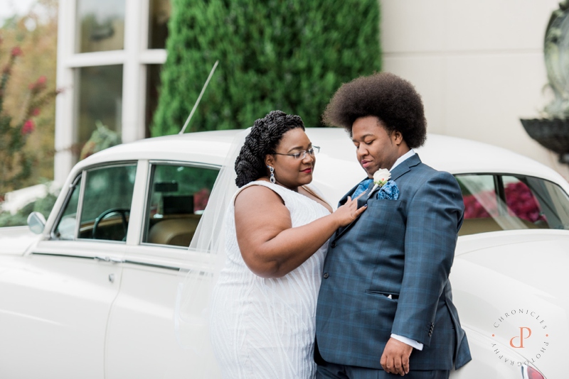 Bride and Groom in front of Rolls-Royce Wedding Vehicle